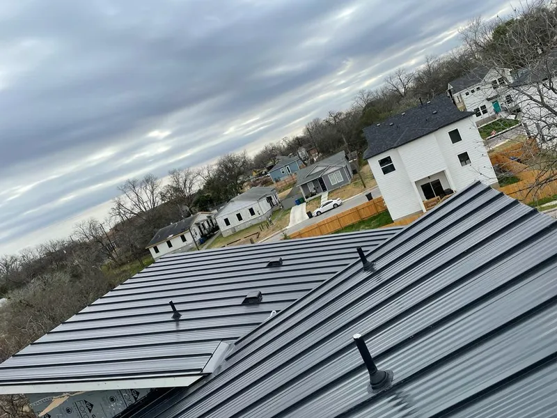 Standing seam metal roof panels with vents for Skylight Repair in New Hartford